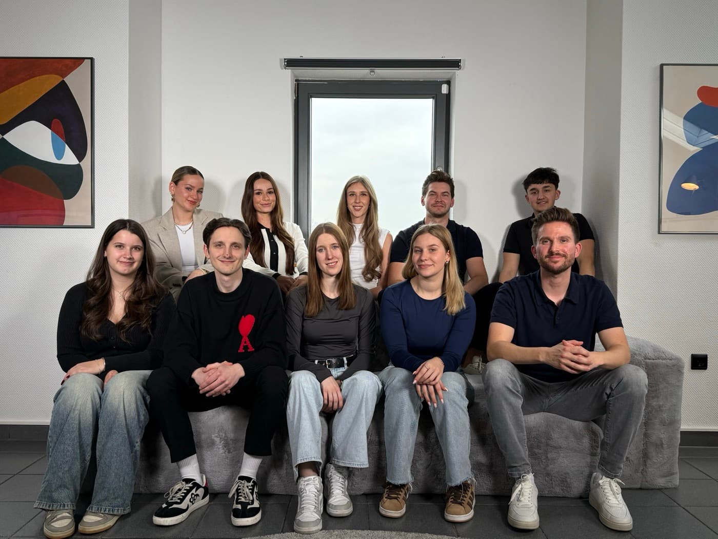 The team on the office sofa